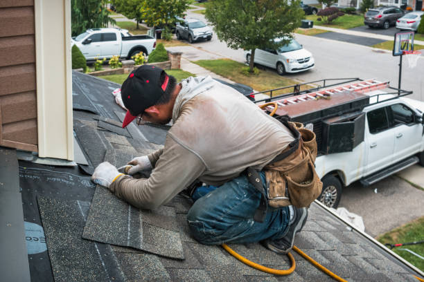 Professional Roofing technician working in Cherry Valley, IL